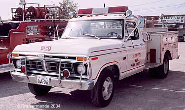small white fire engine built on pickup truck chassis