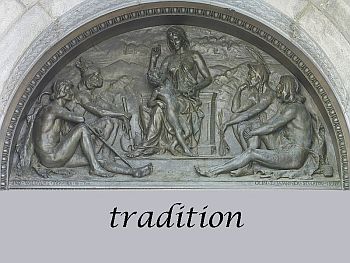 bas-relief of group of people, one is teaching others, text: tradition